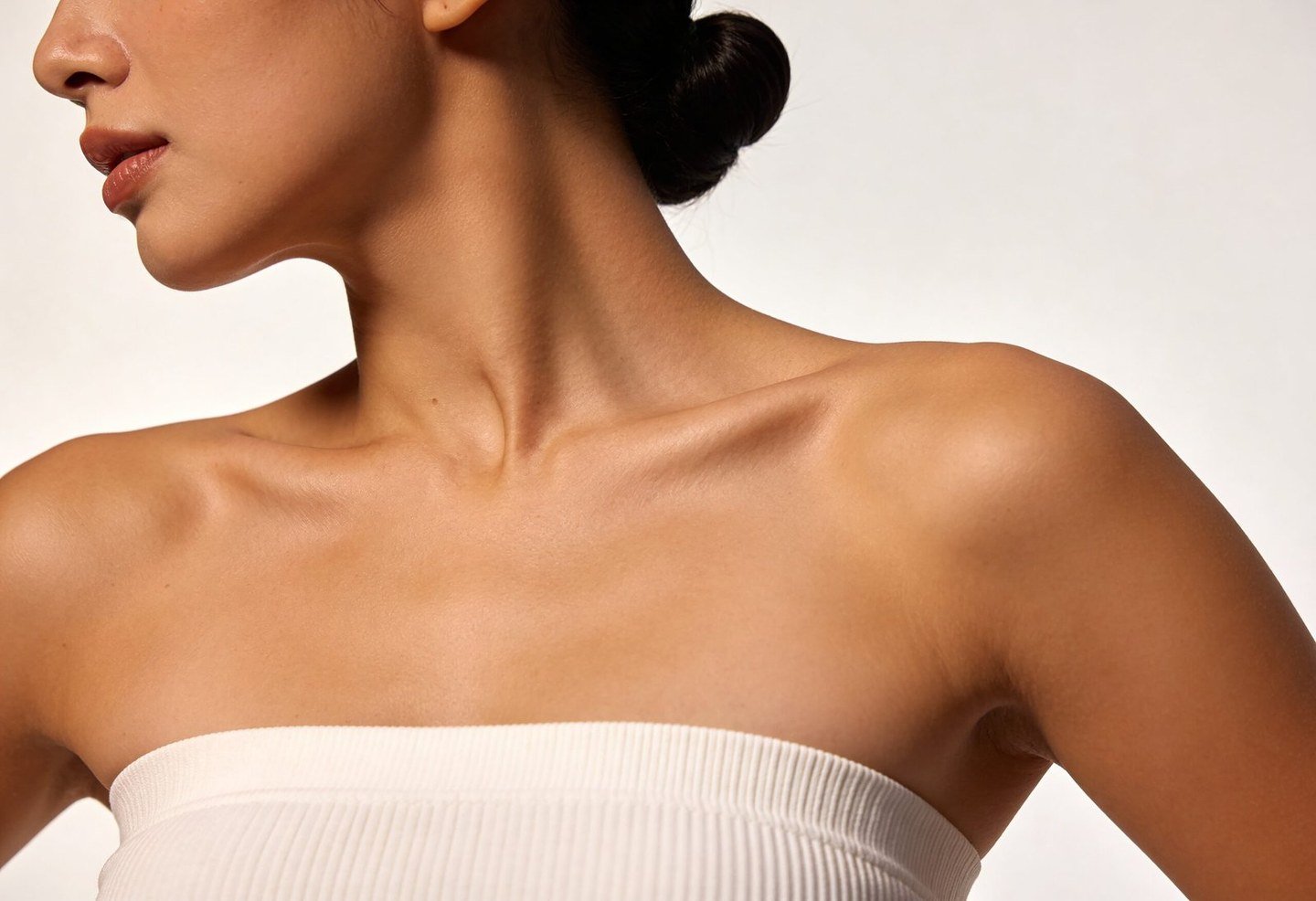 Studio detail of the neckline and shoulder contour